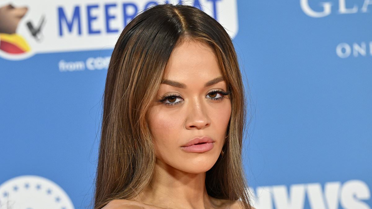taylor-alert-–-rita-ora-leads-the-red-carpet-glamour-in-a-pink-feathered-gown-as-she-joins-maya-jama,-vick-hope-and-raye-at-the-mtv-emas-in-manchester-ahead-of-her-history-making-third-appearance-as-host-of-annual-ceremony